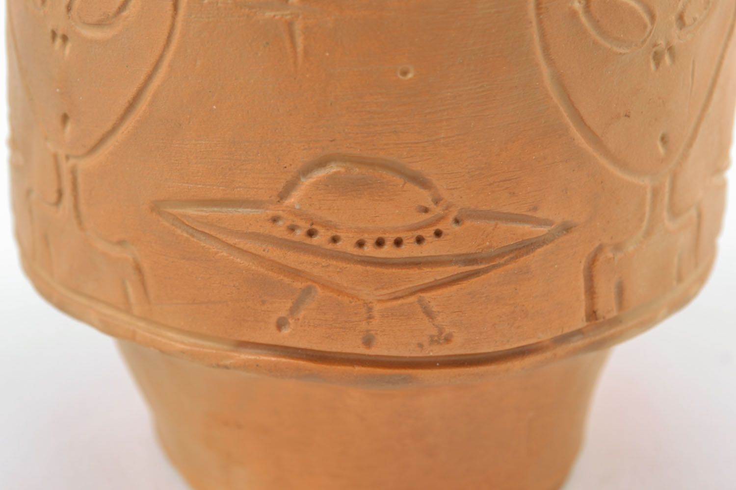 Unusual clay glass UFO photo 2