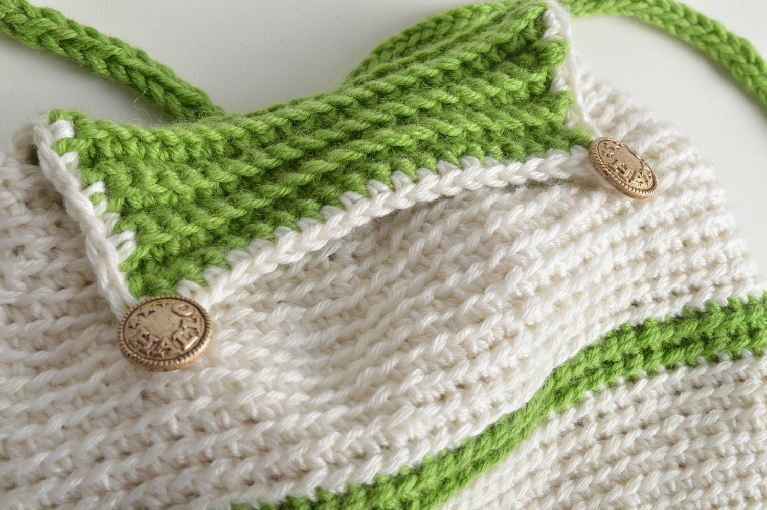 Children's handmade designer stylish crochet backpack of white and green colors photo 3