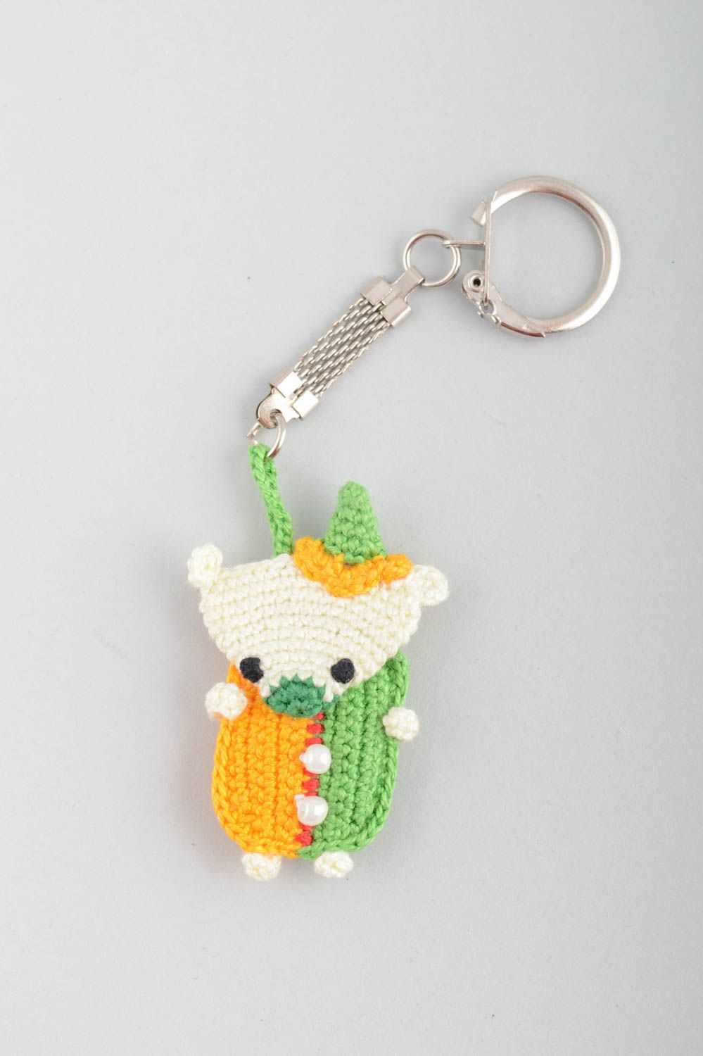 Handmade decorative soft keychain in the form of bear amigurumi toy photo 2