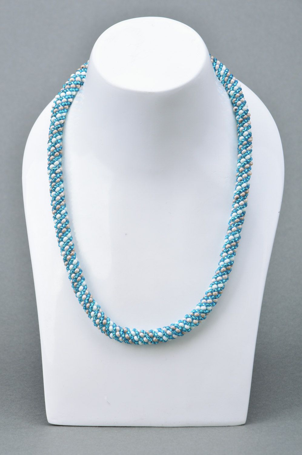 Handmade tender beaded cord necklace in blue and white colors for women photo 3
