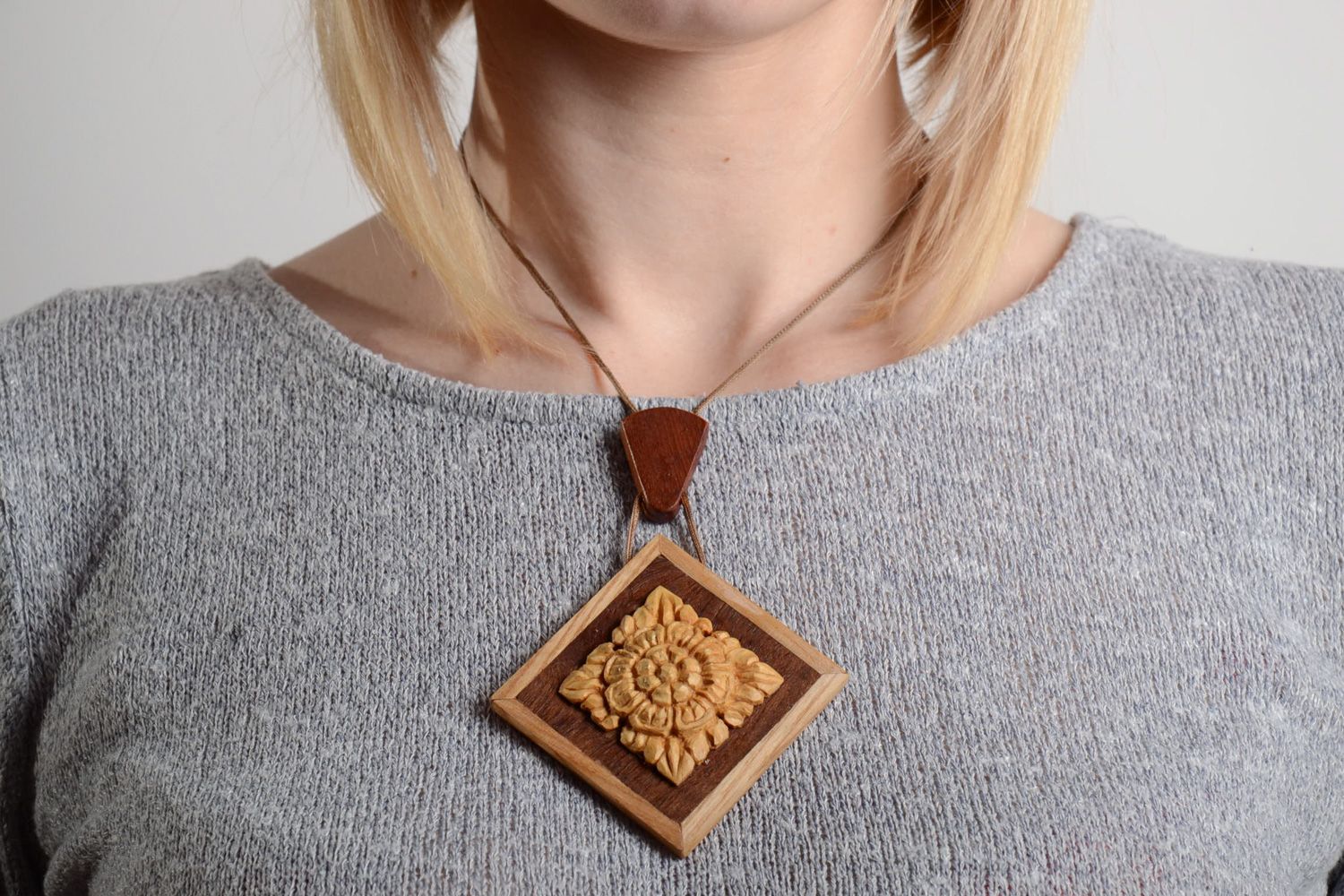 Handmade carved wooden neck pendant with intarsia equipped with cord for women photo 2