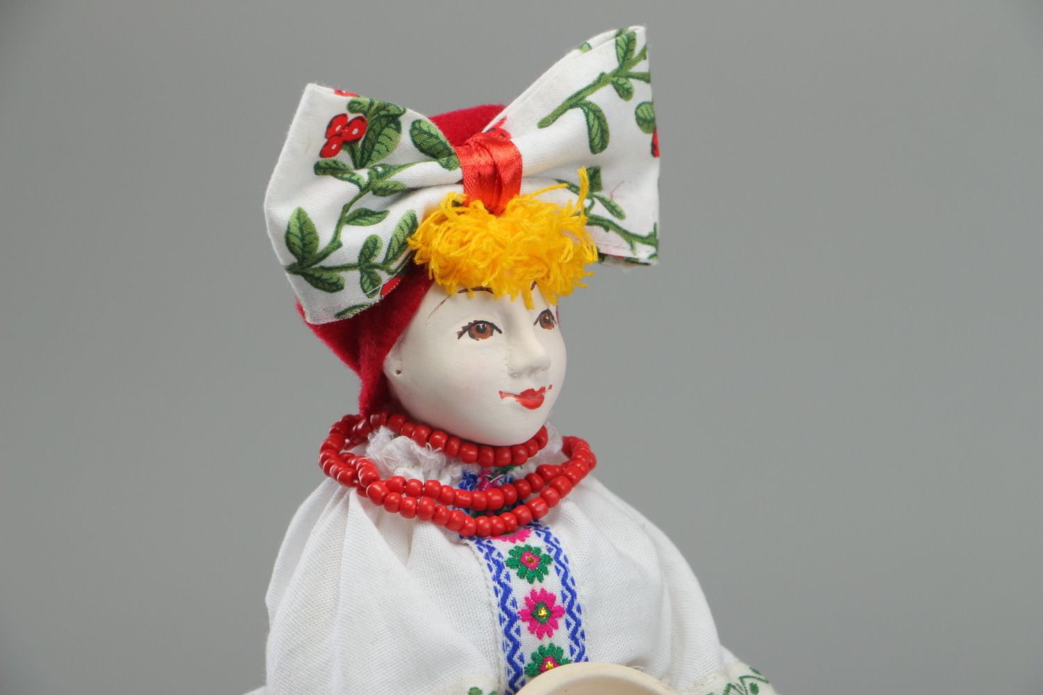 Handmade teapot cozy in the shape of a doll with ceramic face in Ukrainian style photo 2
