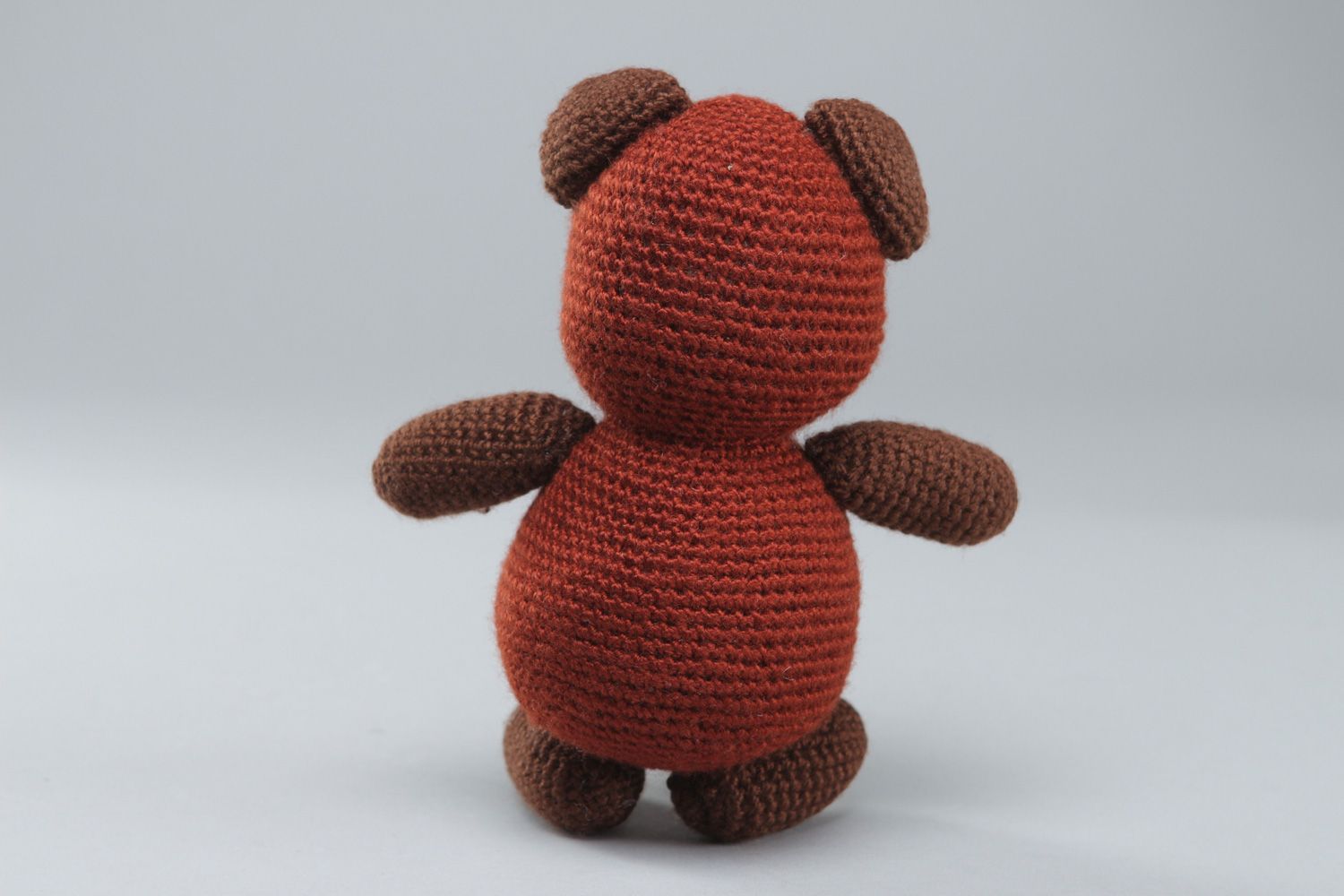 Cute handmade soft toy bear crocheted of brown acrylic threads for children photo 3