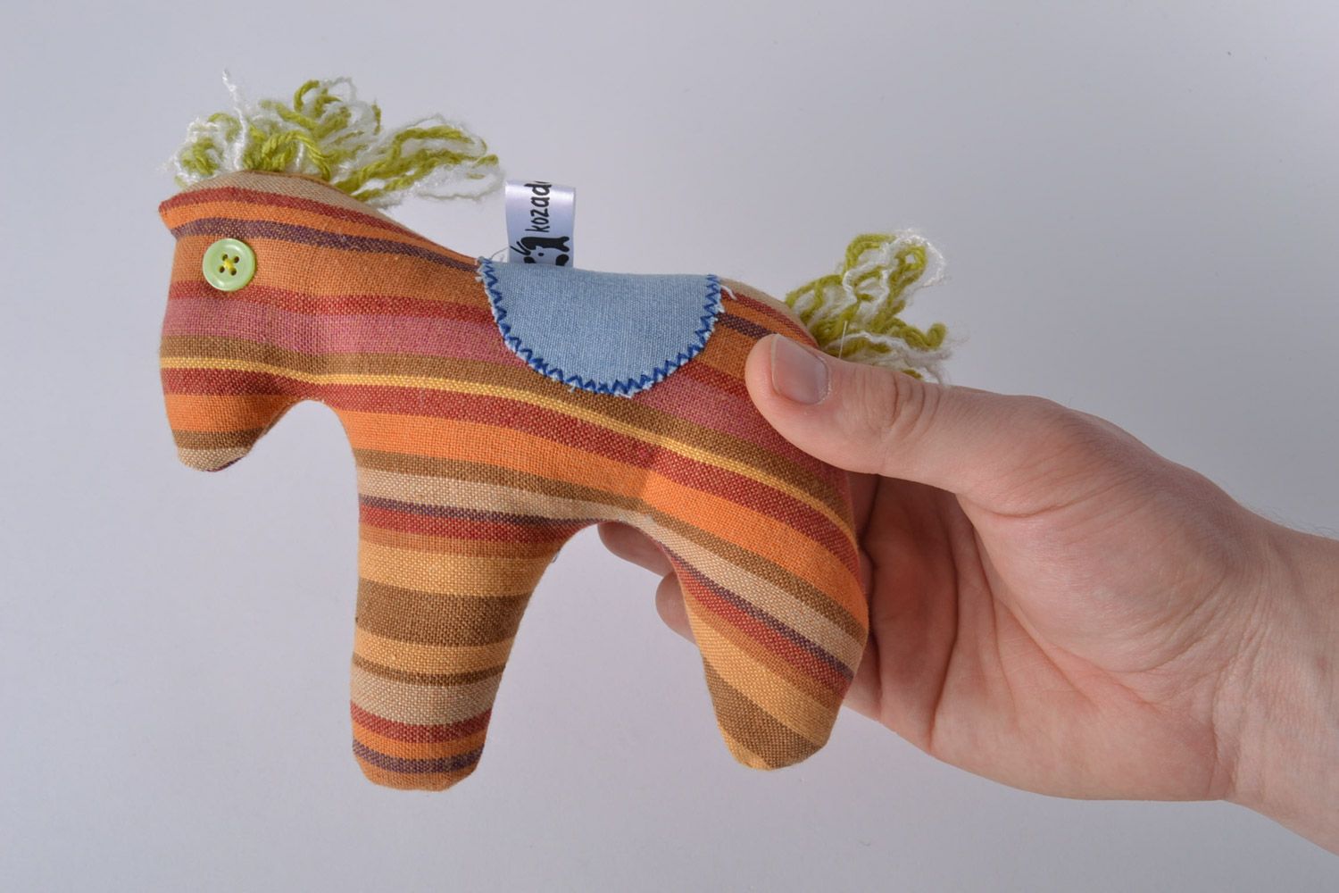 Handmade funny soft toy sewn of striped colorful fabric horse for children photo 5
