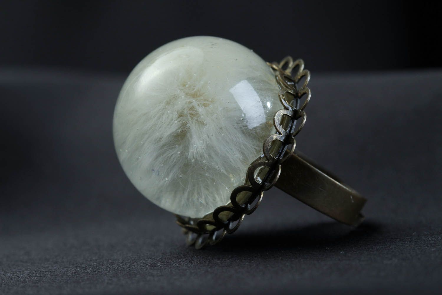 Ring with dandelion coated with epoxy photo 1