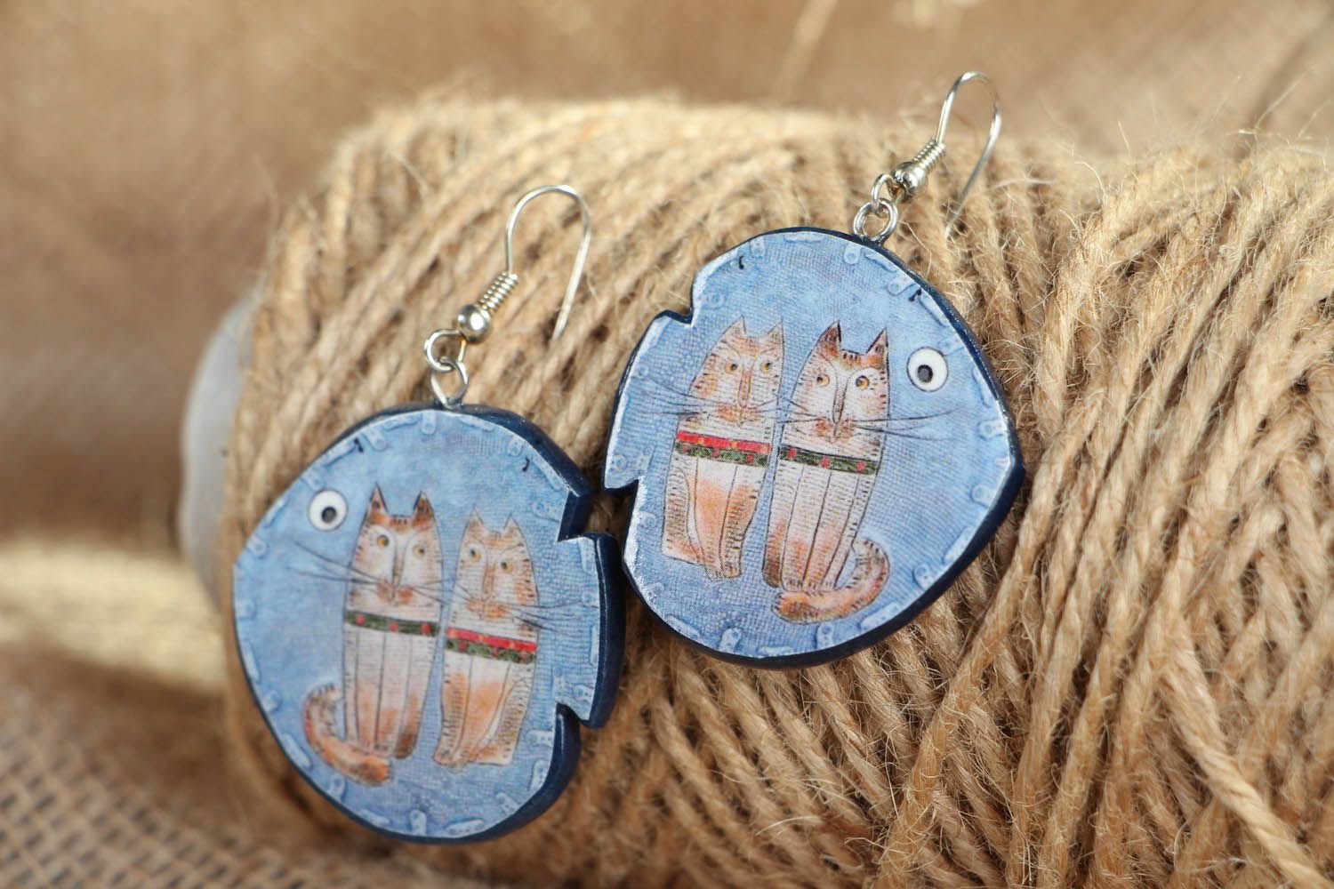 Boucles d'oreilles artisanales en forme de poissons photo 3