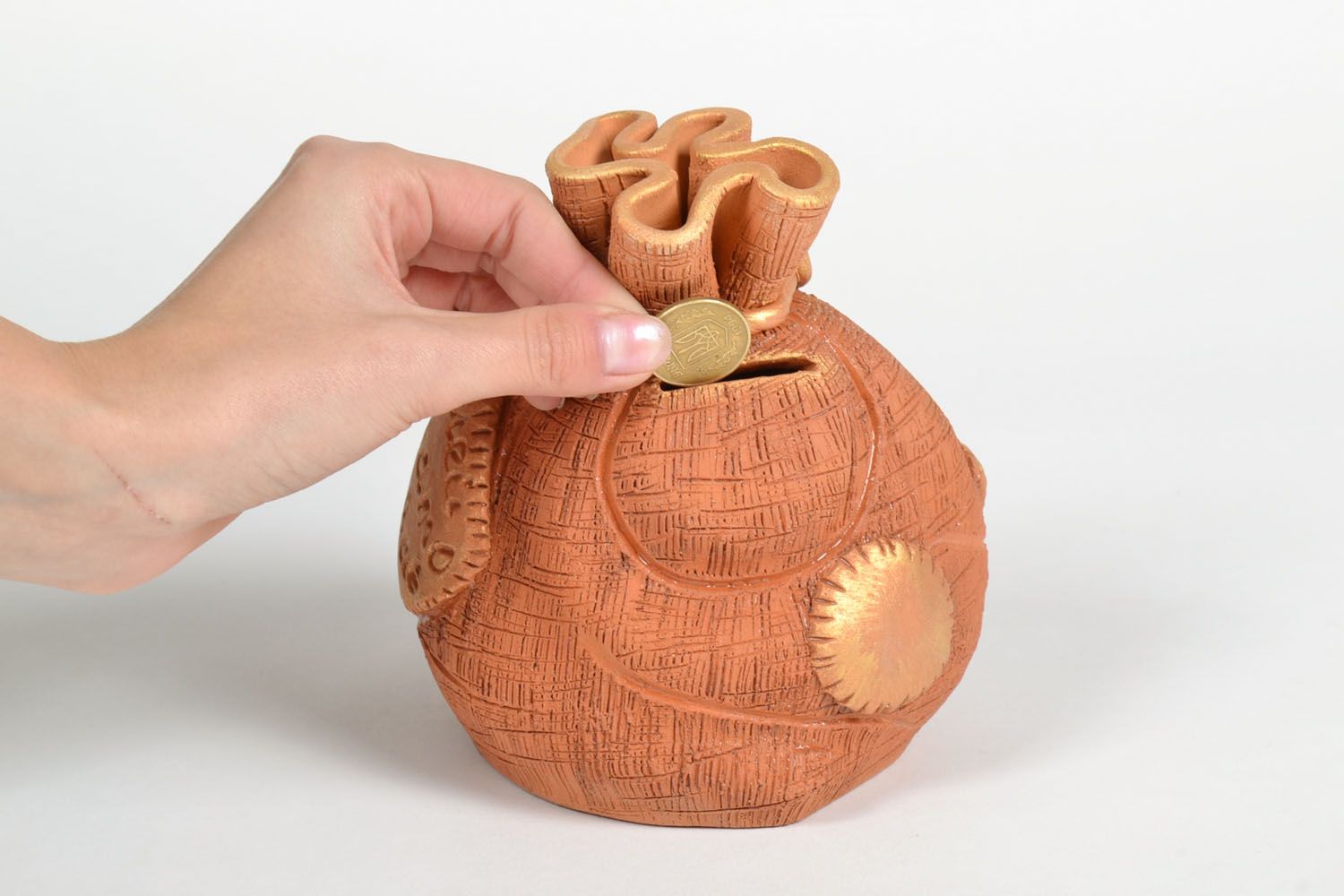 Clay money box in the shape of sack photo 5