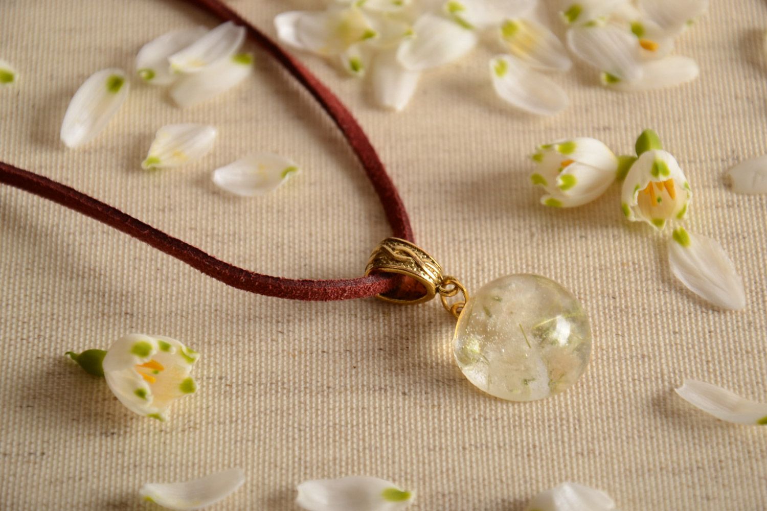 Handmade transparent epoxy resin pendant with real plants photo 1