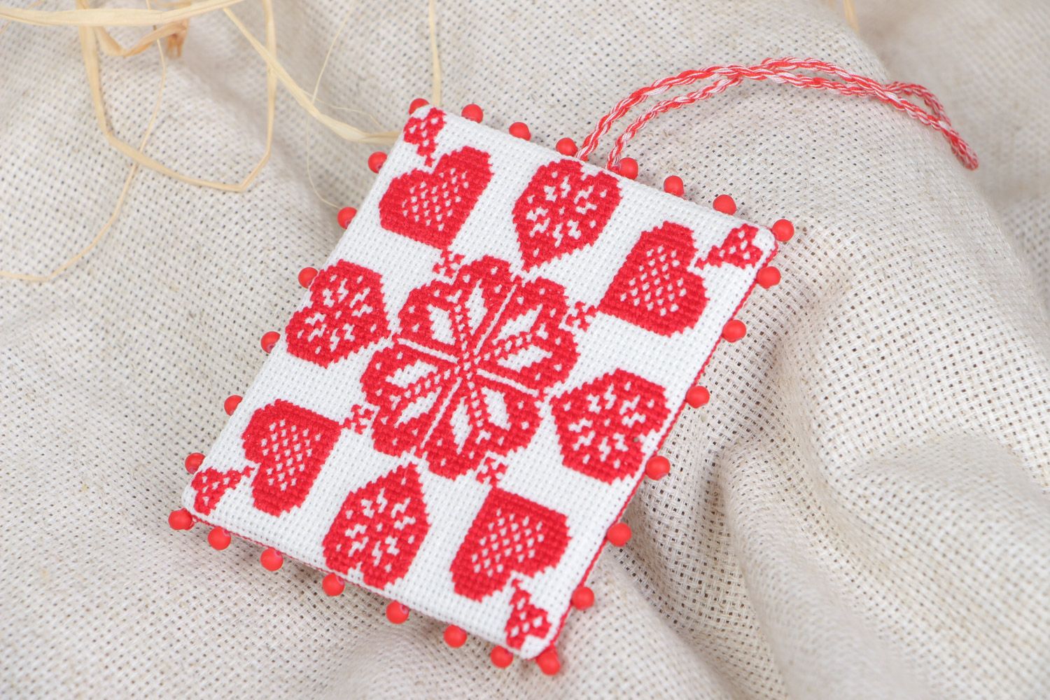 Small handmade white and red pincushion with cross stitch embroidery and eyelet photo 1