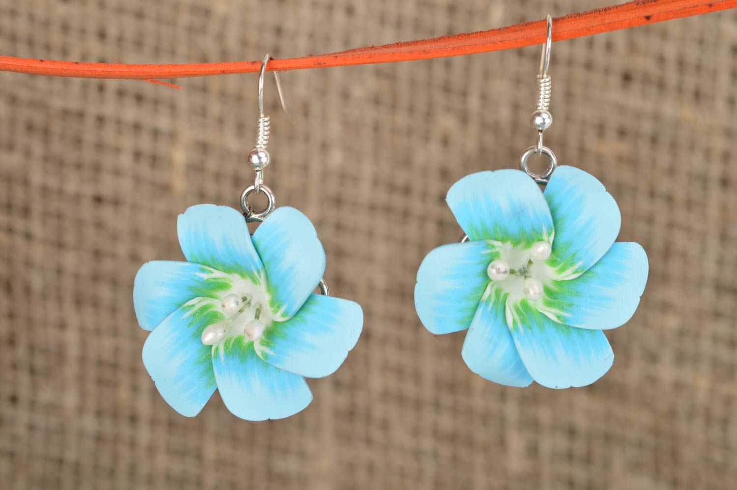 Beautiful homemade designer polymer clay flower earrings of gentle blue color photo 1