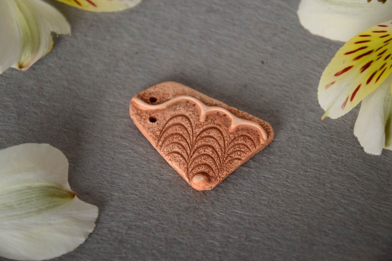 Handmade decorative flat ceramic blank pendant with wave shaped pattern photo 1