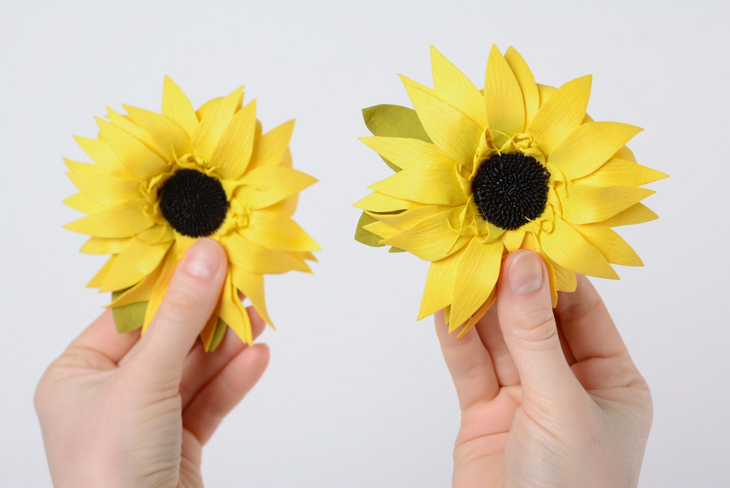 Set of handmade foamiran fabric flower hair clips in the shape of sunflowers 2 items photo 1