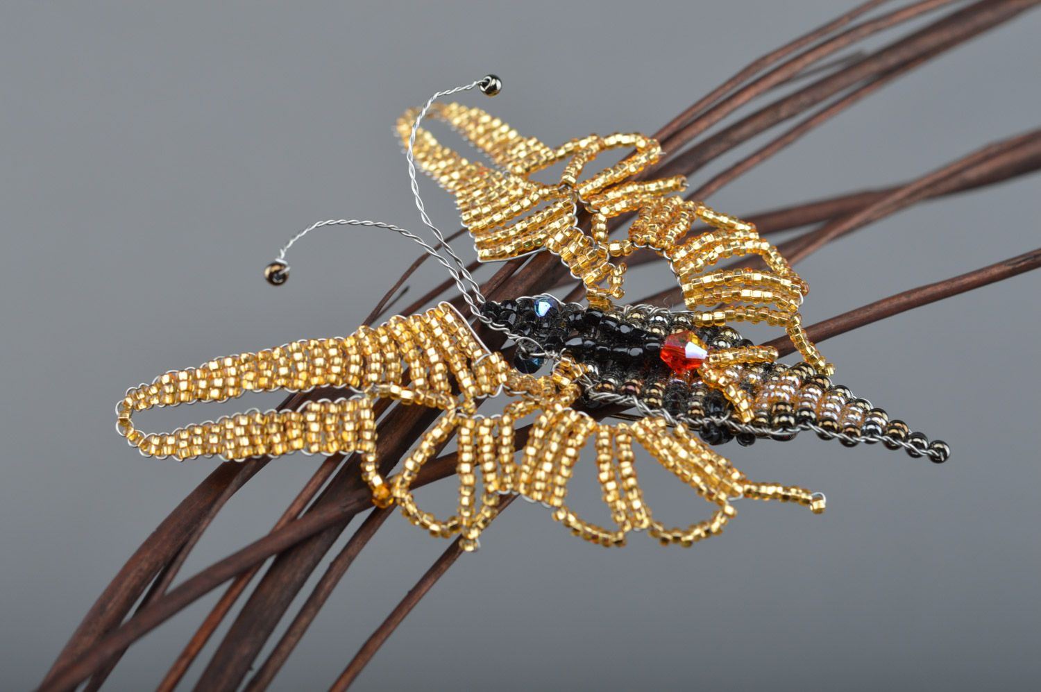 Handmade beaded brooch butterfly of gold and black colors and average size photo 2