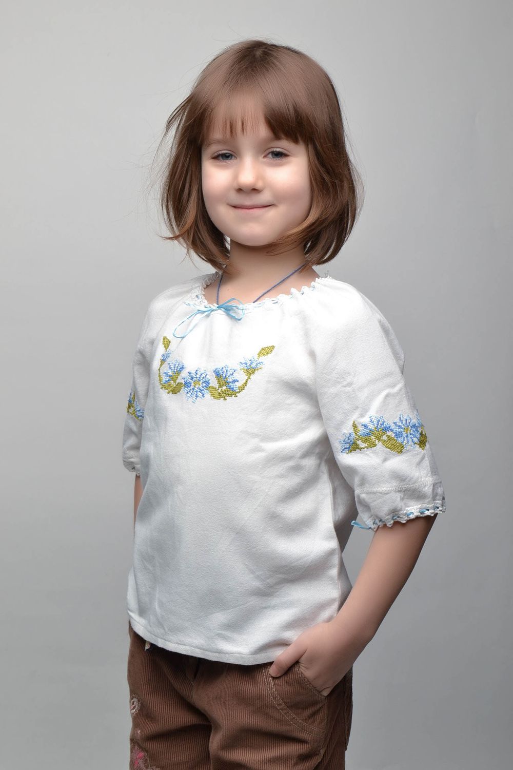 White embroidered blouse for kids photo 1