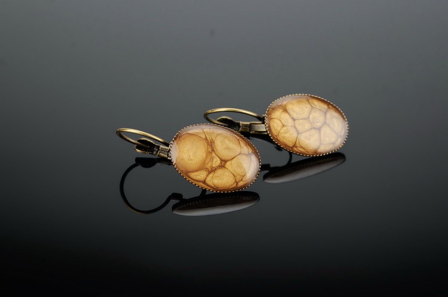 Oval earrings with epoxy photo 1