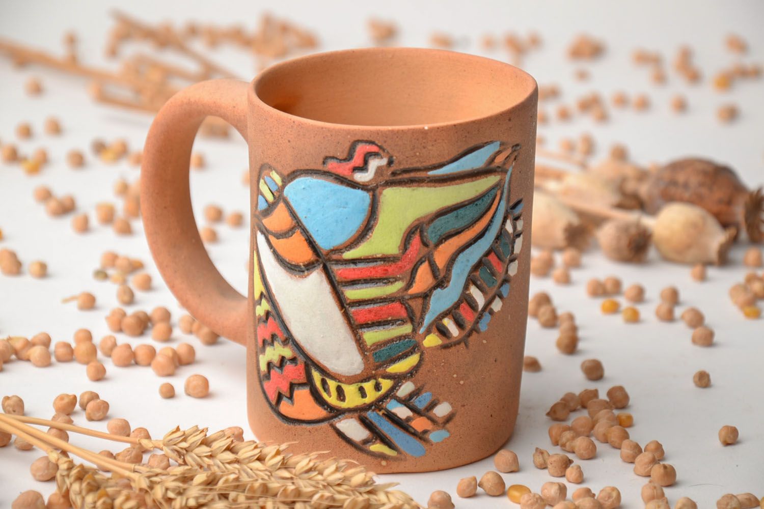 Clay ceramic art style coffee mug with a bright pattern photo 1