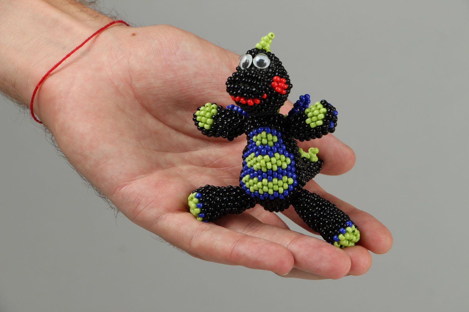 Little dragon toy made of beads photo 4