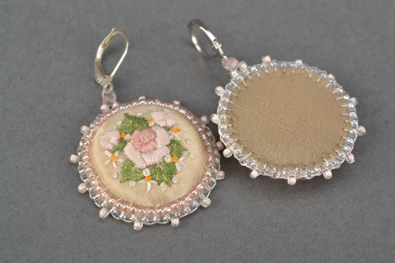 Round embroidered earrings on leather basis photo 3
