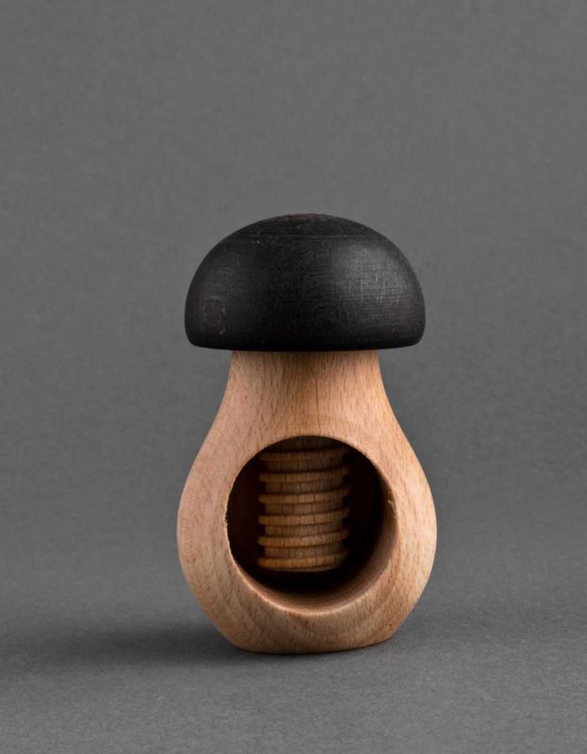 Wooden nutcracker in the shape of a mushroom photo 5