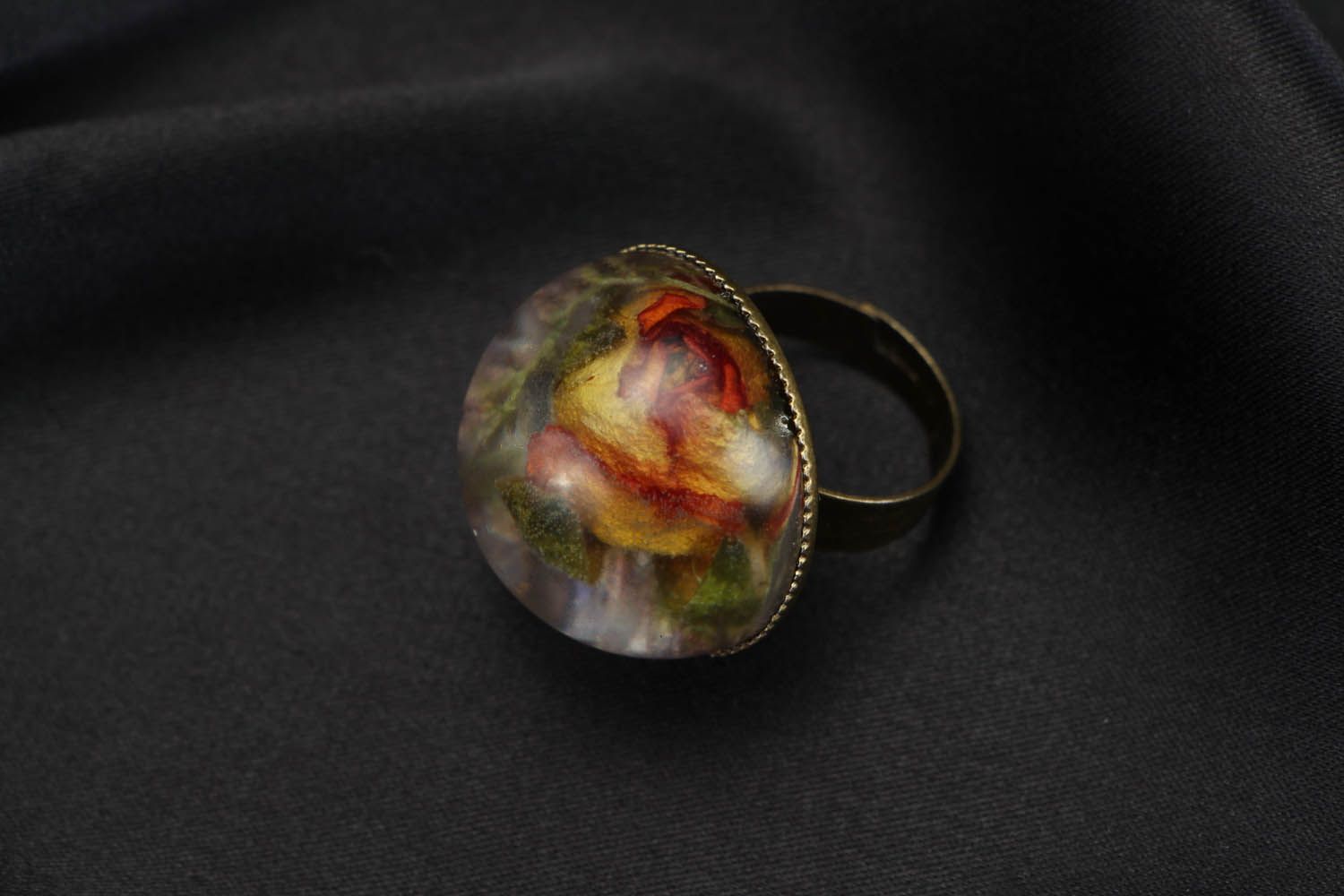 Ring with natural rose coated with jewelry resin photo 2