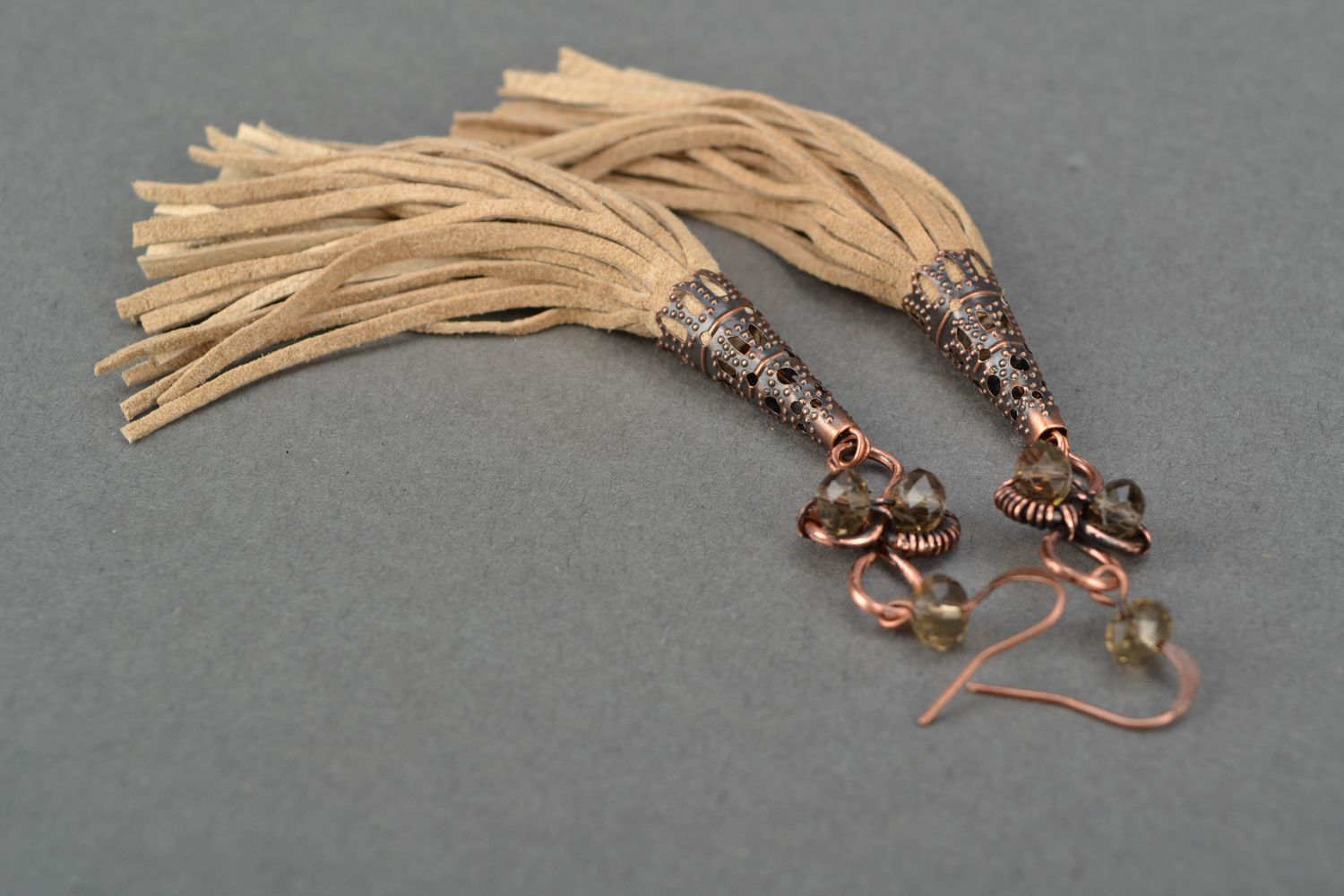 Wire wrap copper earrings with leather fringe of beige color photo 3