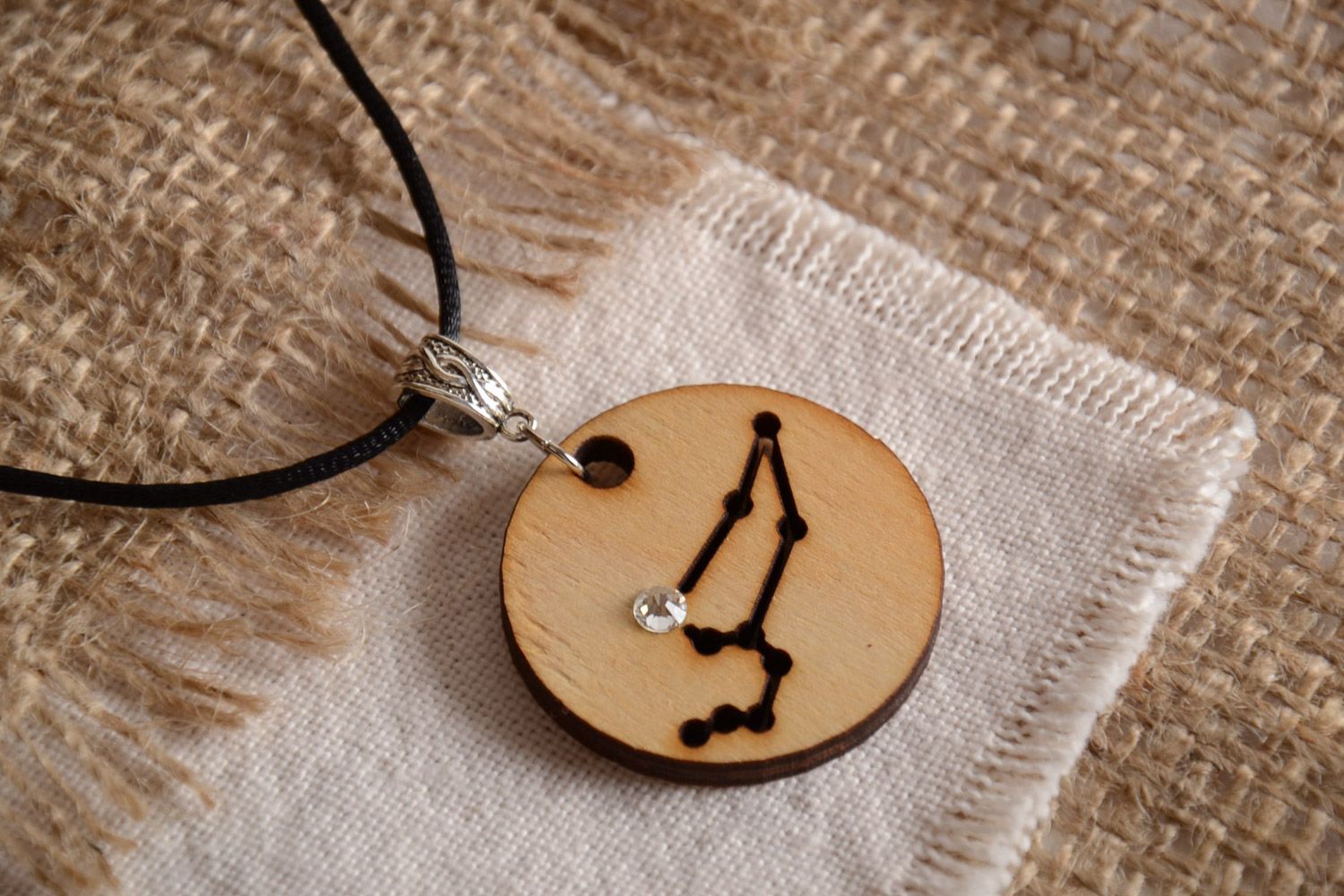 Unusual handmade natural wood pendant with constellation and equipped with cord photo 1