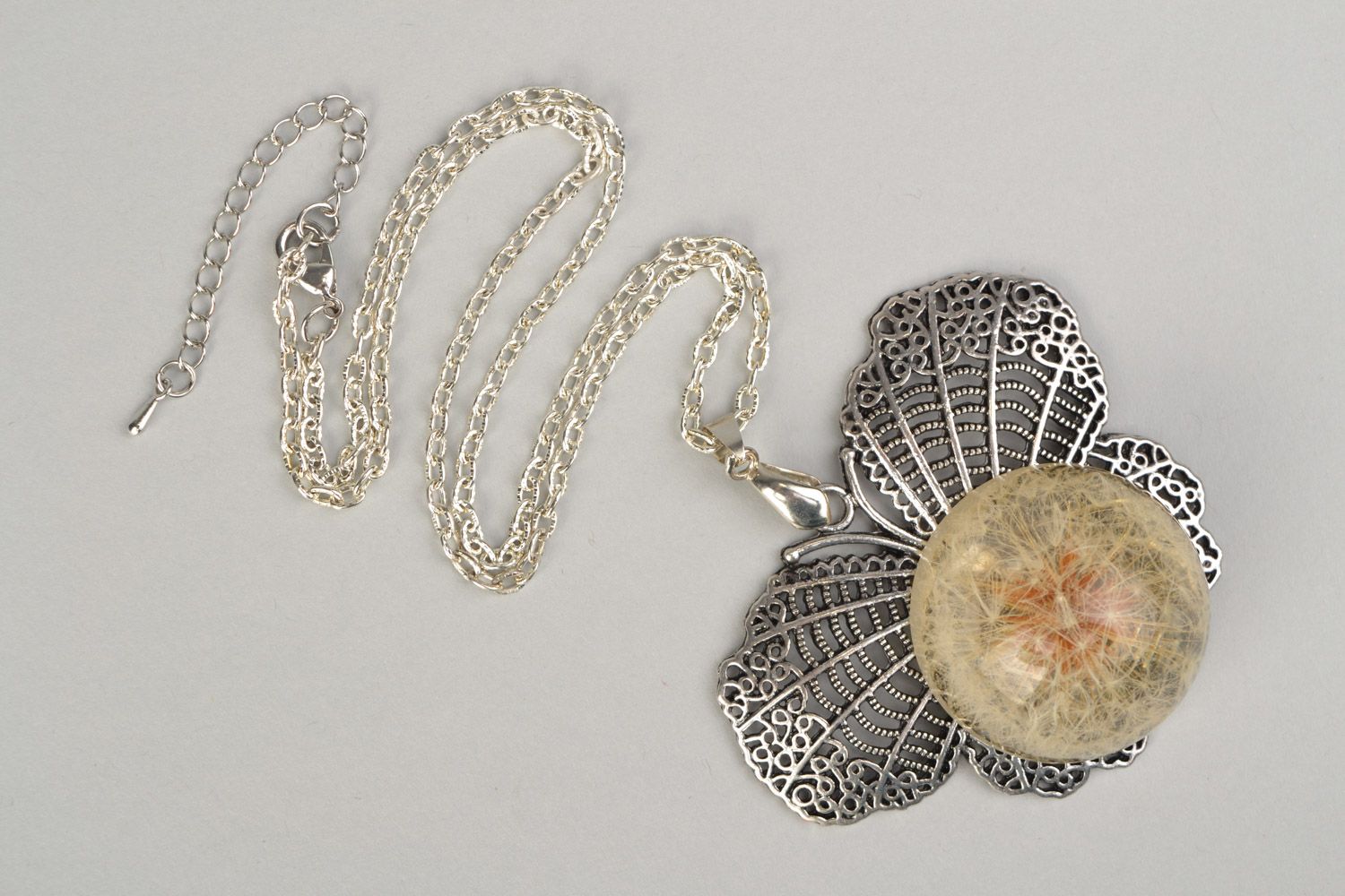 Tender handmade round pendant with dandelion flower in epoxy resin on chain  photo 3