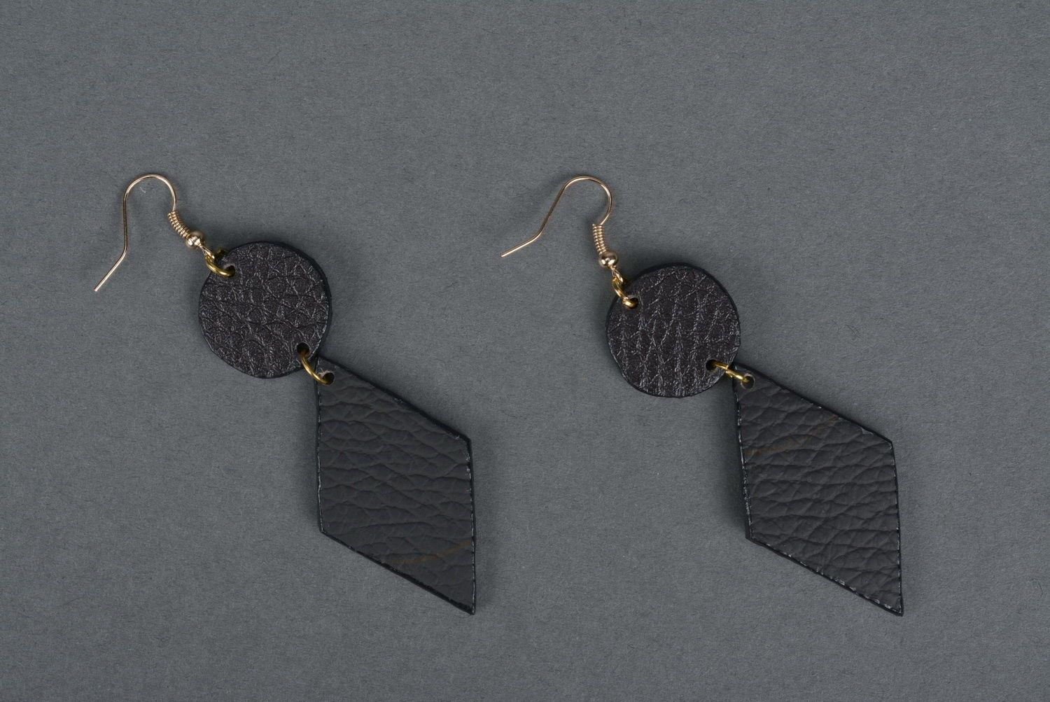 Beautiful earrings made of leather photo 3