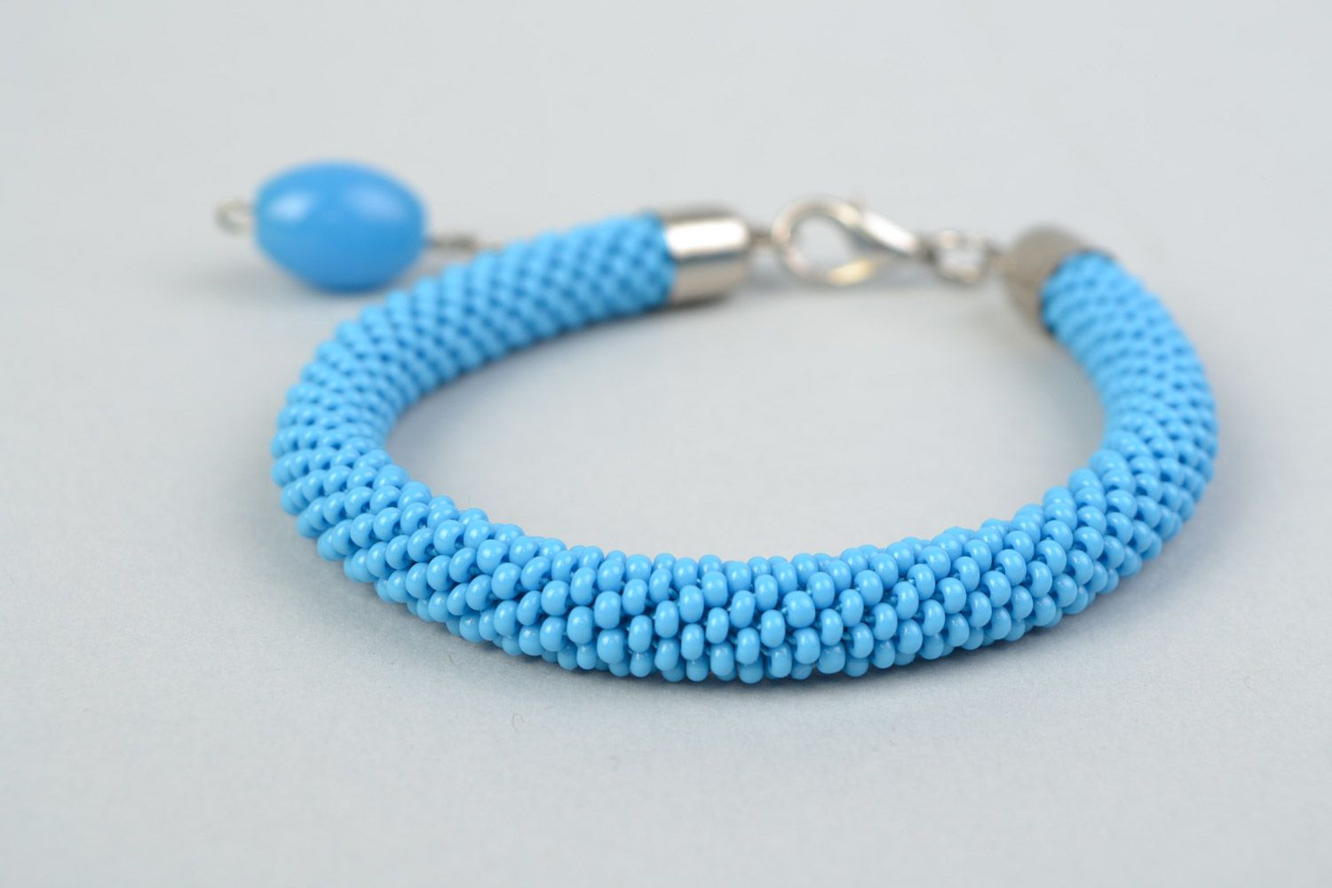 Handmade blue wrist bracelet crocheted of Czech beads with bead charm for women photo 3