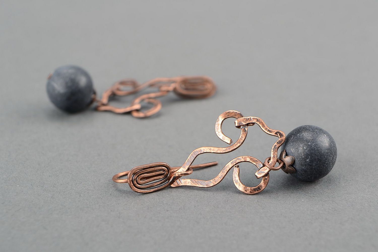 Earrings made of copper wire with schungite photo 2