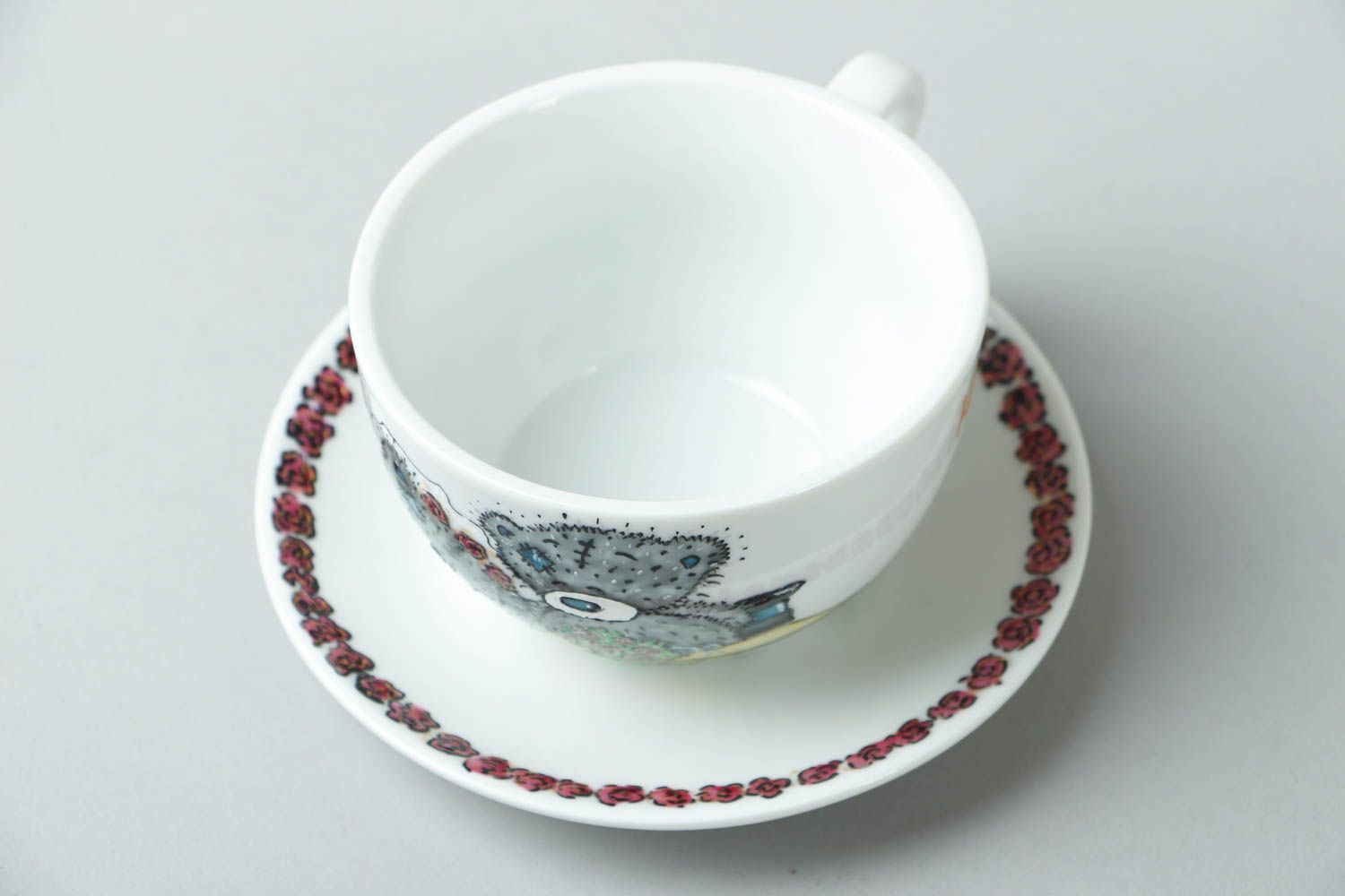 Porcelain white cup with handle, sauce, and teddy bears' pattern photo 2