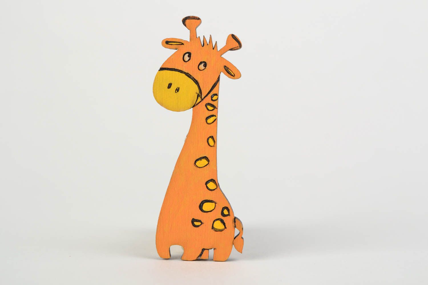 Children's handmade wooden brooch in the shape of giraffe painted with acrylics photo 1