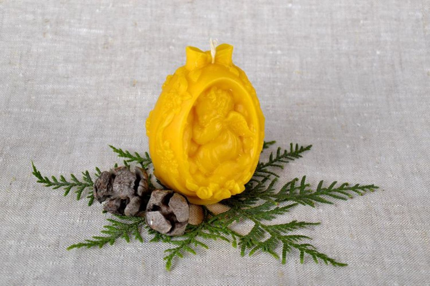 Candle made of beeswax Egg with Angel photo 1