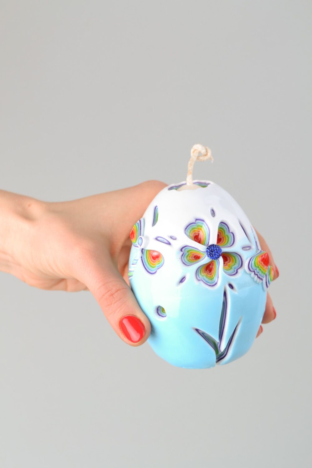 Handgemachte vielfarbige kleine Kerze aus Paraffin in Form des Eies für Haus Dekoration  foto 2