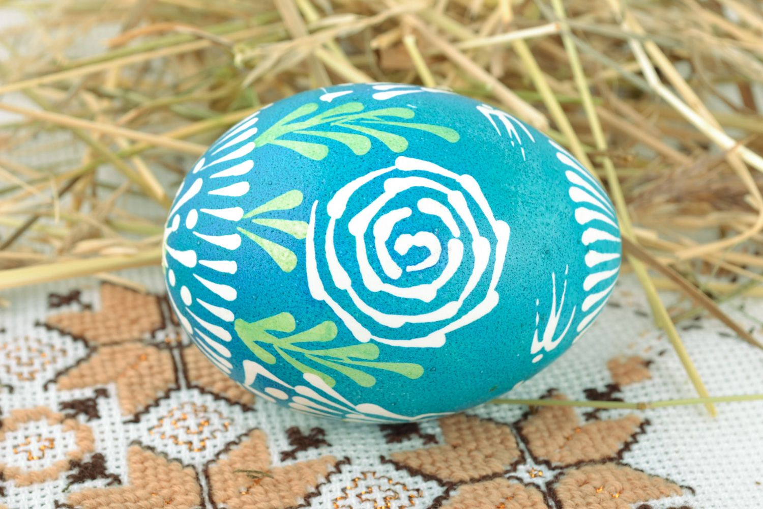 Handmade painted Easter egg with minimalistic ornament in blue color palette photo 1