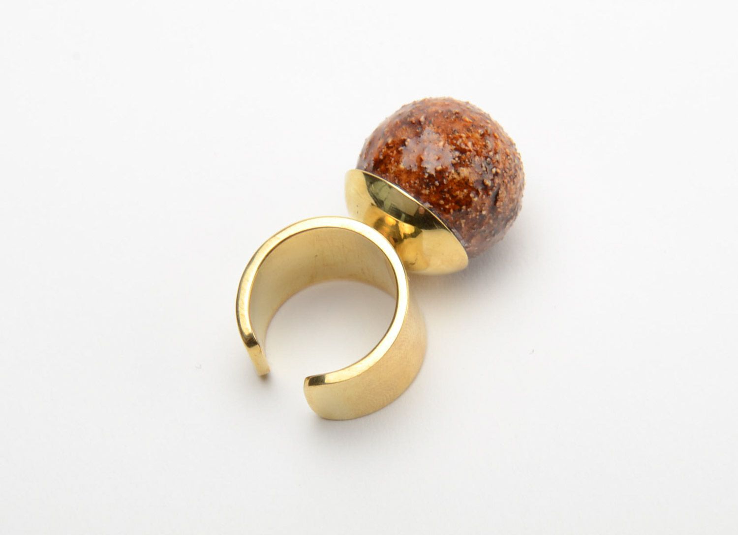 Brown handmade ceramic ring with golden-like brass basis photo 4