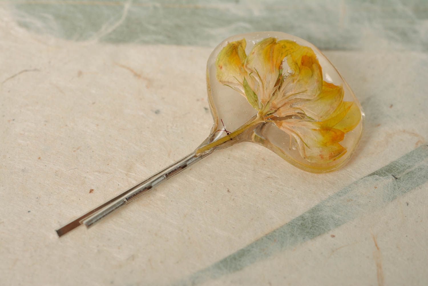 Handmade decorative metal hair pin with yellow dried flower in epoxy resin photo 1