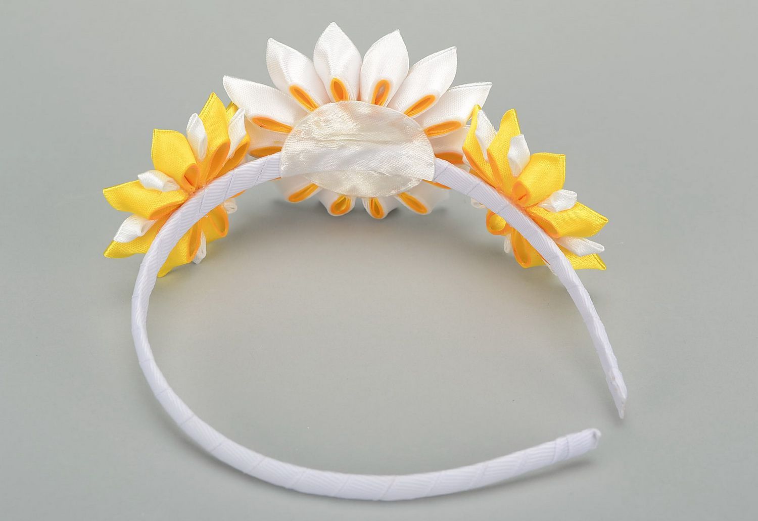 Decorative headband with satin flowers photo 1