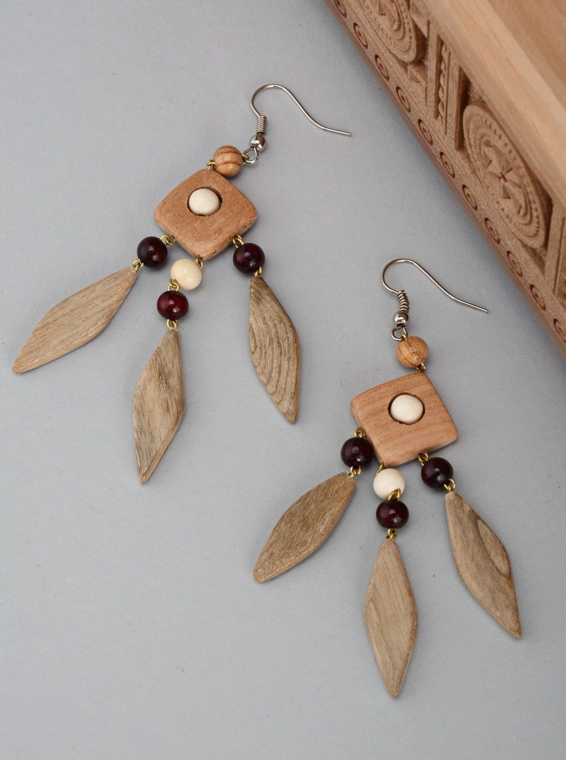 Earrings made of different wood species photo 1