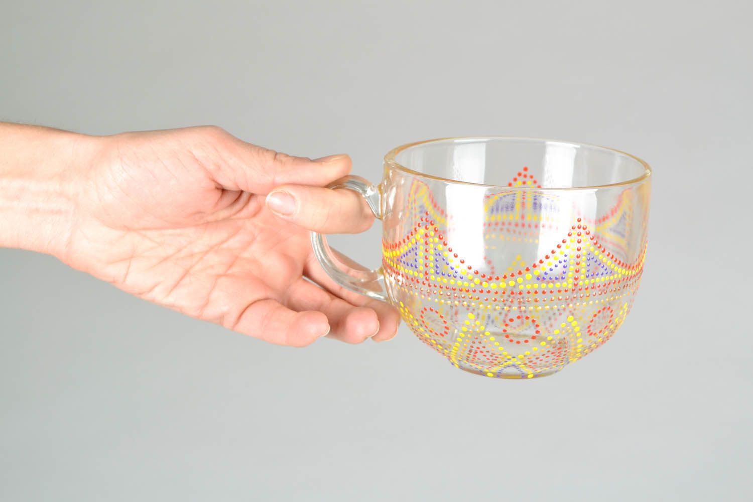 Clear glass8 oz tea cup with handle and red, yellow dot pattern photo 2