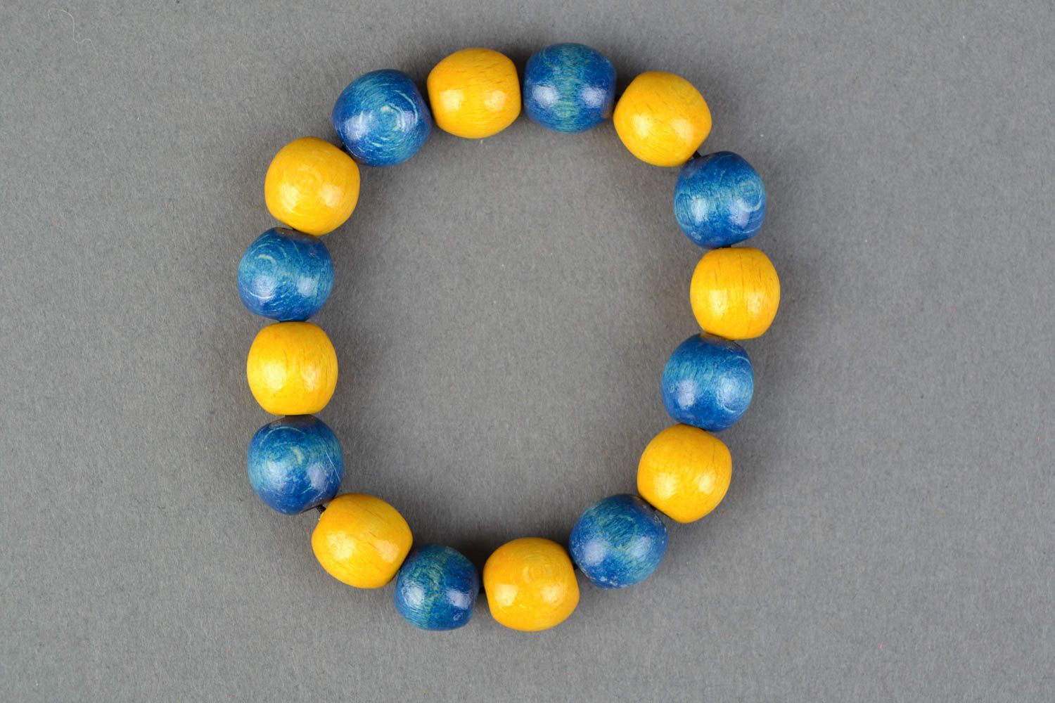 Yellow and blue handmade wooden bracelet photo 4