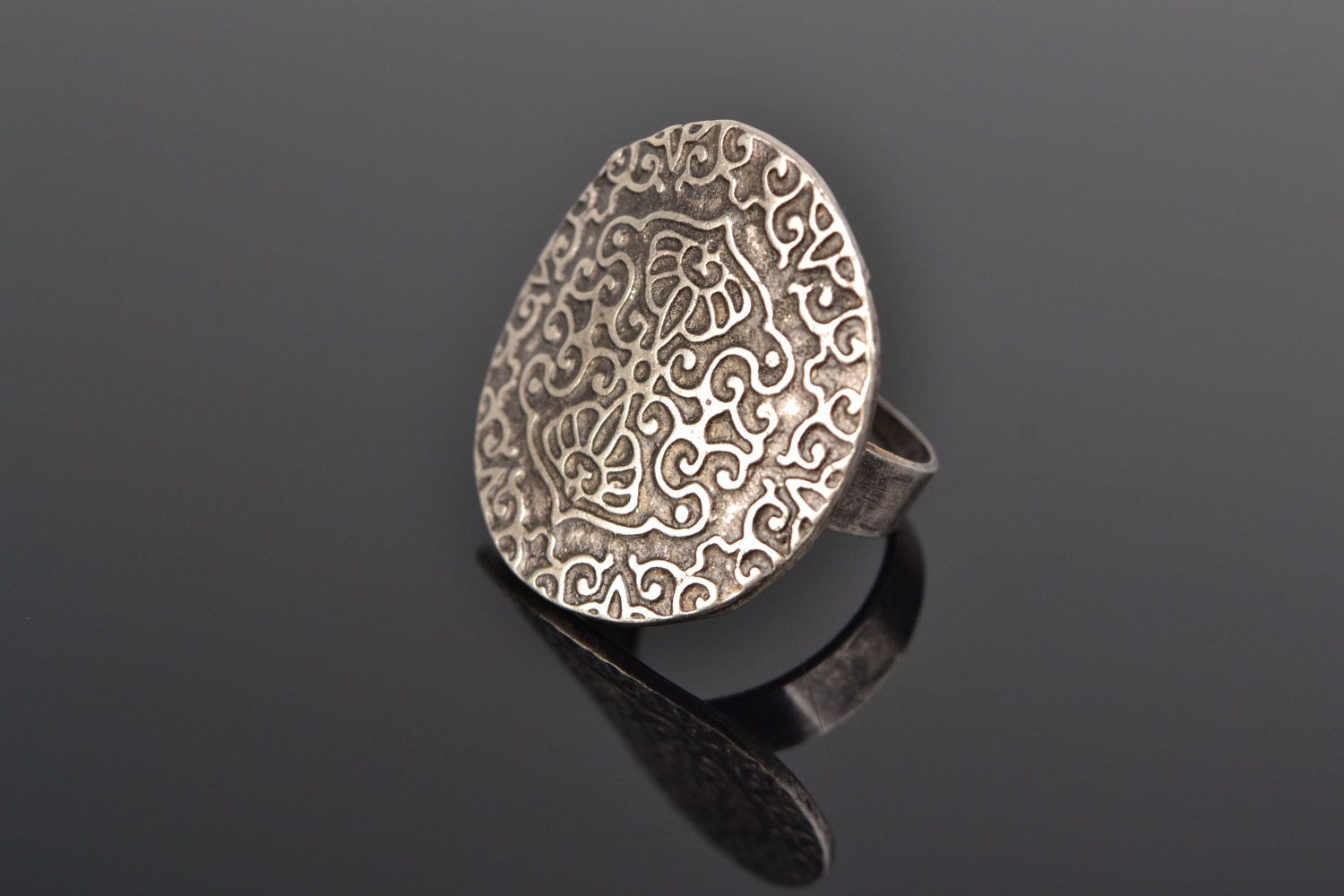 Large handmade round metal ring with ornament in ethnic style for women photo 1