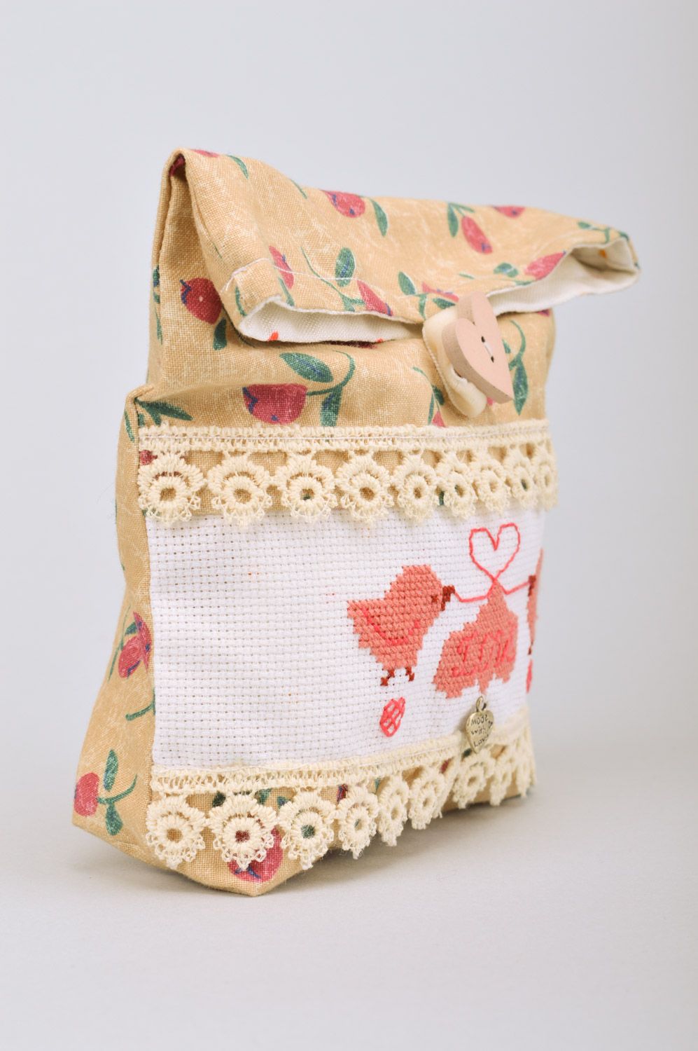 Handmade cosmetics bag sewn of cotton with cross stitch embroidery and button photo 2