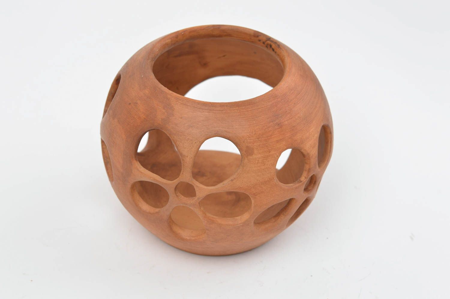 Bougeoir en céramique ajouré en forme de boule brun fait main pour une bougie photo 3