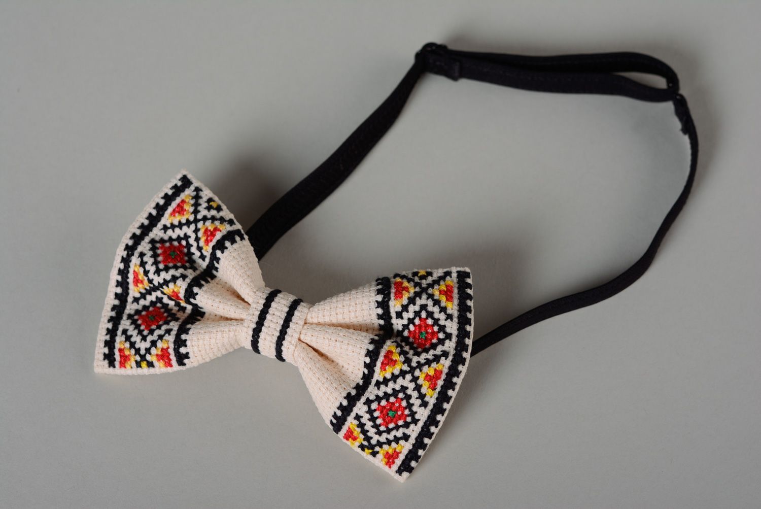 Handmade ethnic white bow tie with traditional cross stitch embroidery for men photo 2