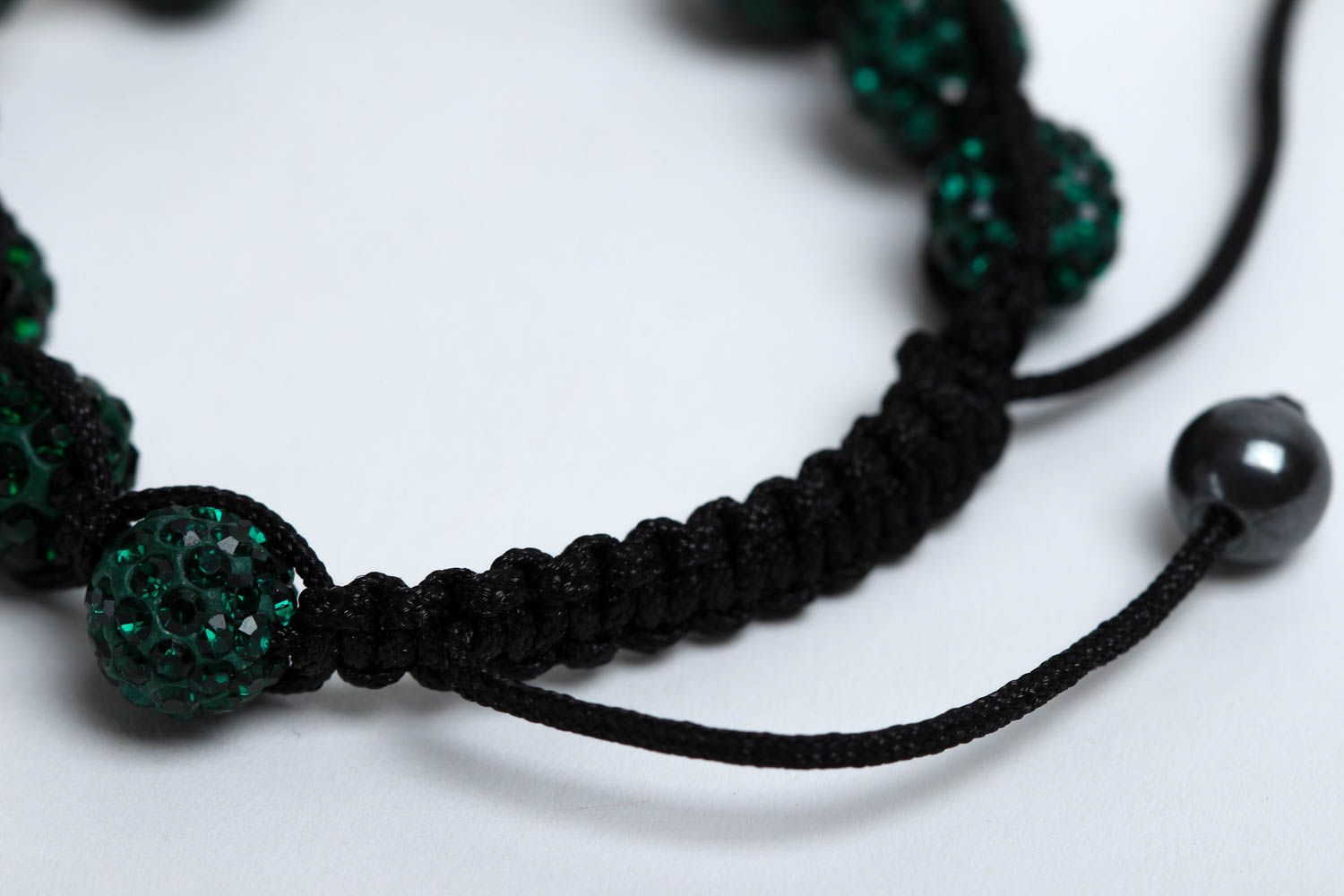Dark green bead bracelet with strand black cord photo 4