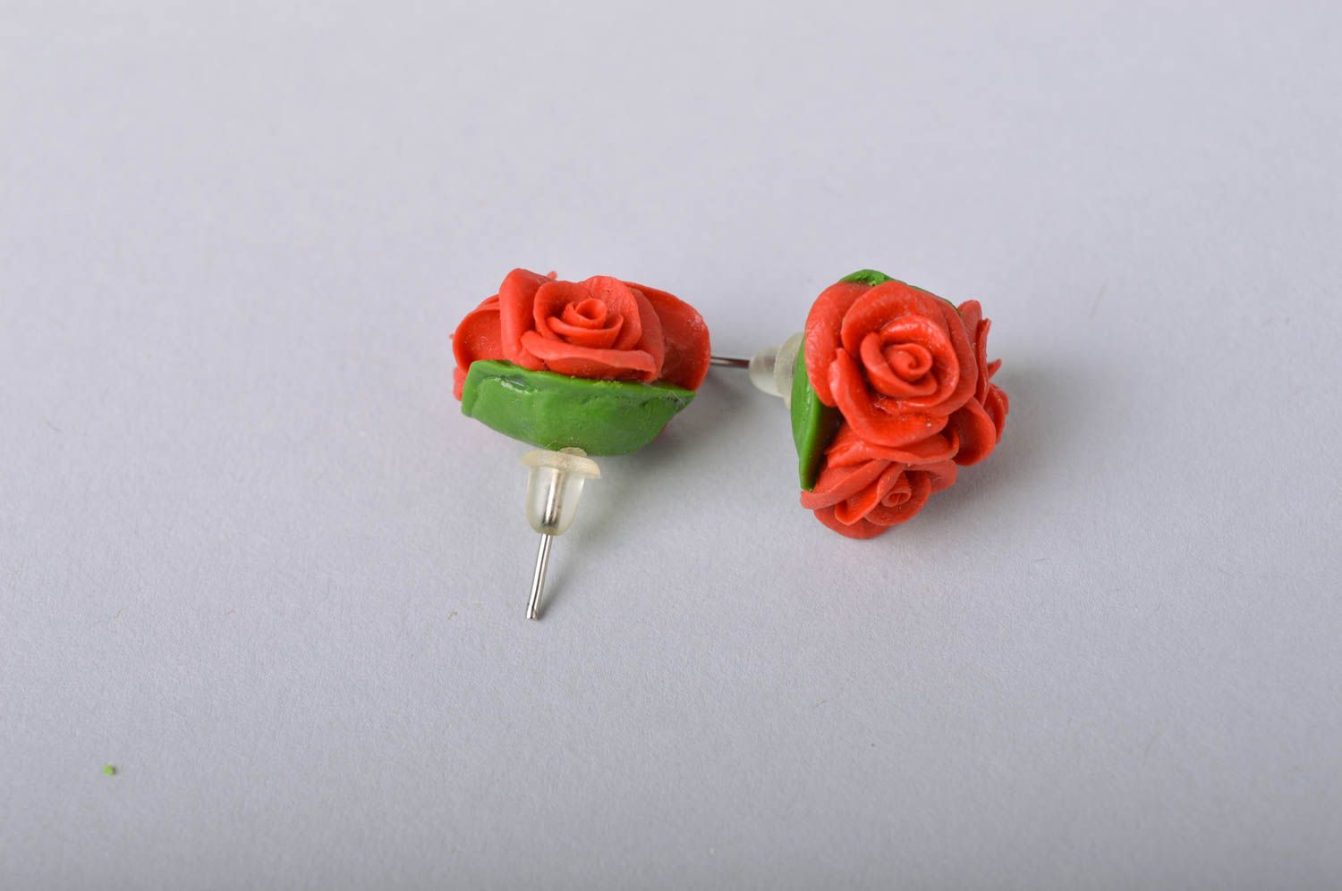 Handmade flower stud earrings made of cold porcelain in shape of red roses photo 5