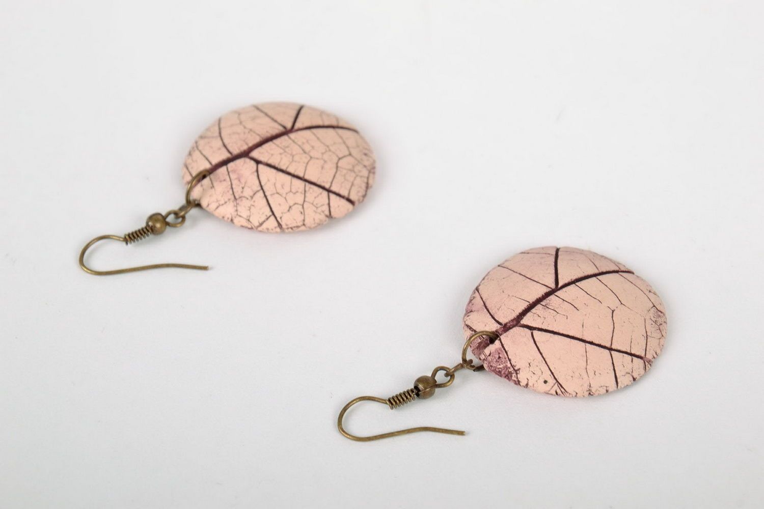 Earrings with impress of natural plant photo 1