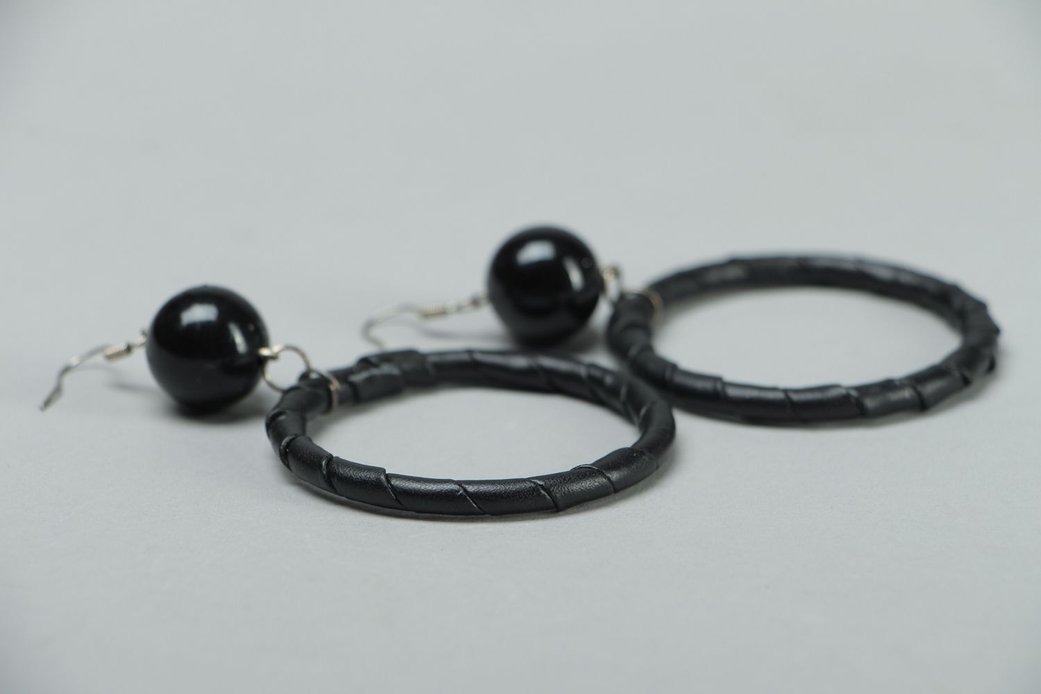 Artificial leather hoop earrings with beads photo 2