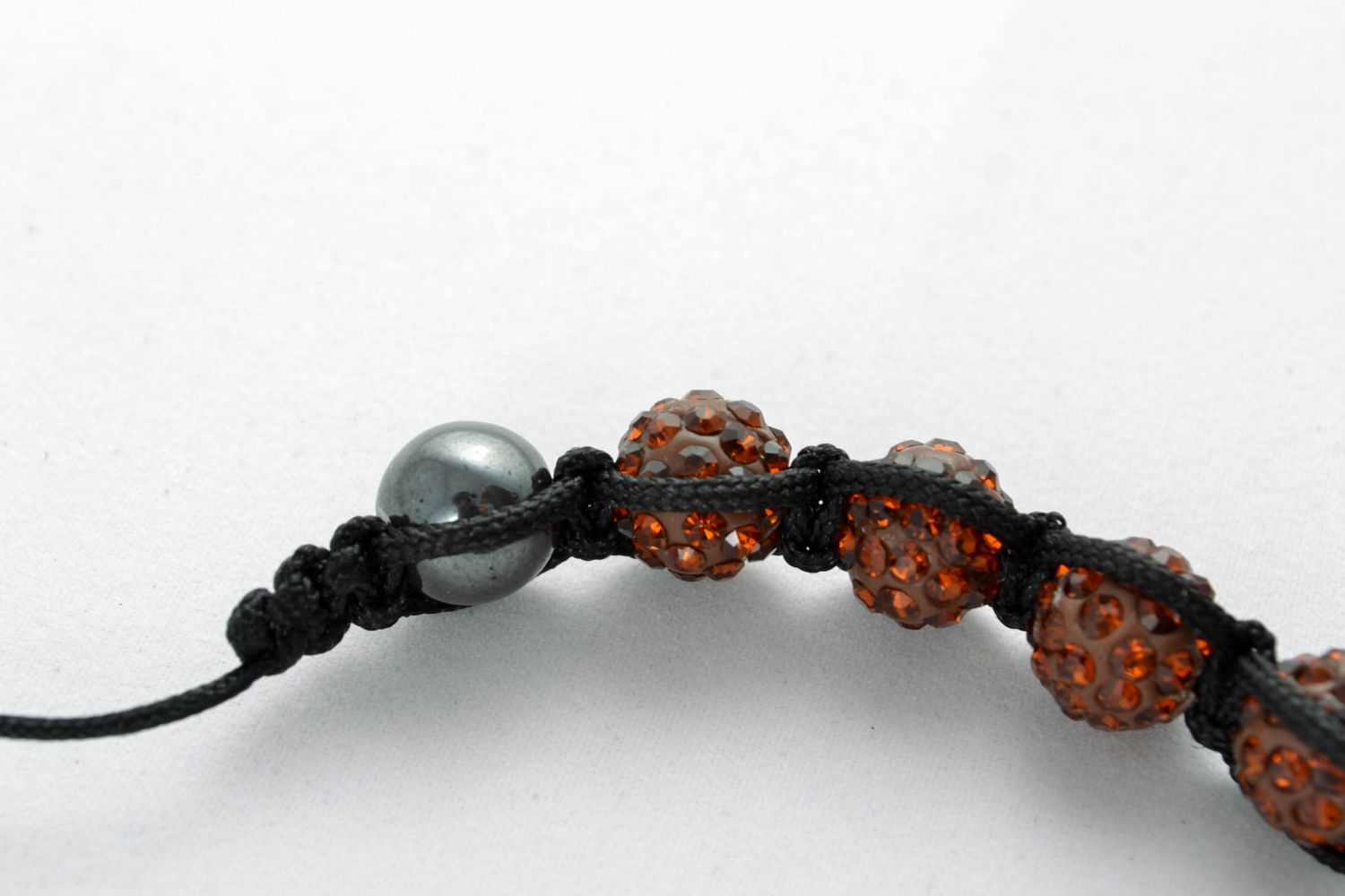 Woven bead bracelet with strasses photo 5
